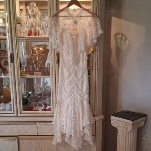 Ivory Lace Ruffled Wedding Dress.Very Delicate look with It's Pearl Neck Accents